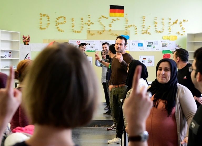 Syrians in Germany face fight fit for Kafka to see families Syrians in Germany face fight fit for Kafka to see families