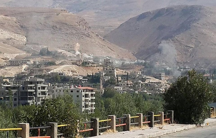 Deadly clashes grip flashpoint area near Syria capital