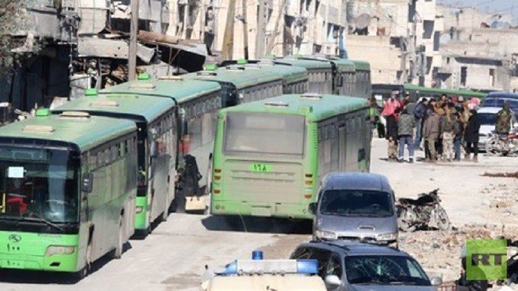 Buses evacuate hundreds from four besieged Syria towns