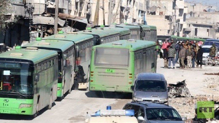 Buses evacuate hundreds from four besieged Syria towns Buses evacuate hundreds from four besieged Syria towns