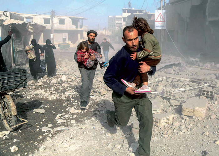 Syrian forces pound rebel bastion near Damascus, war monitor says Syrian forces pound rebel bastion near Damascus, war monitor says