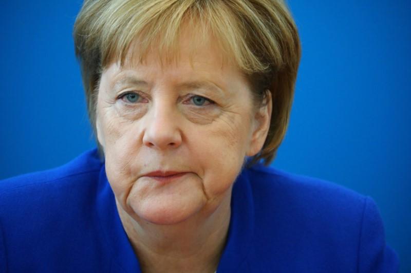 Merkel and Jewish head warn of rising anti-Semitism at pogrom event