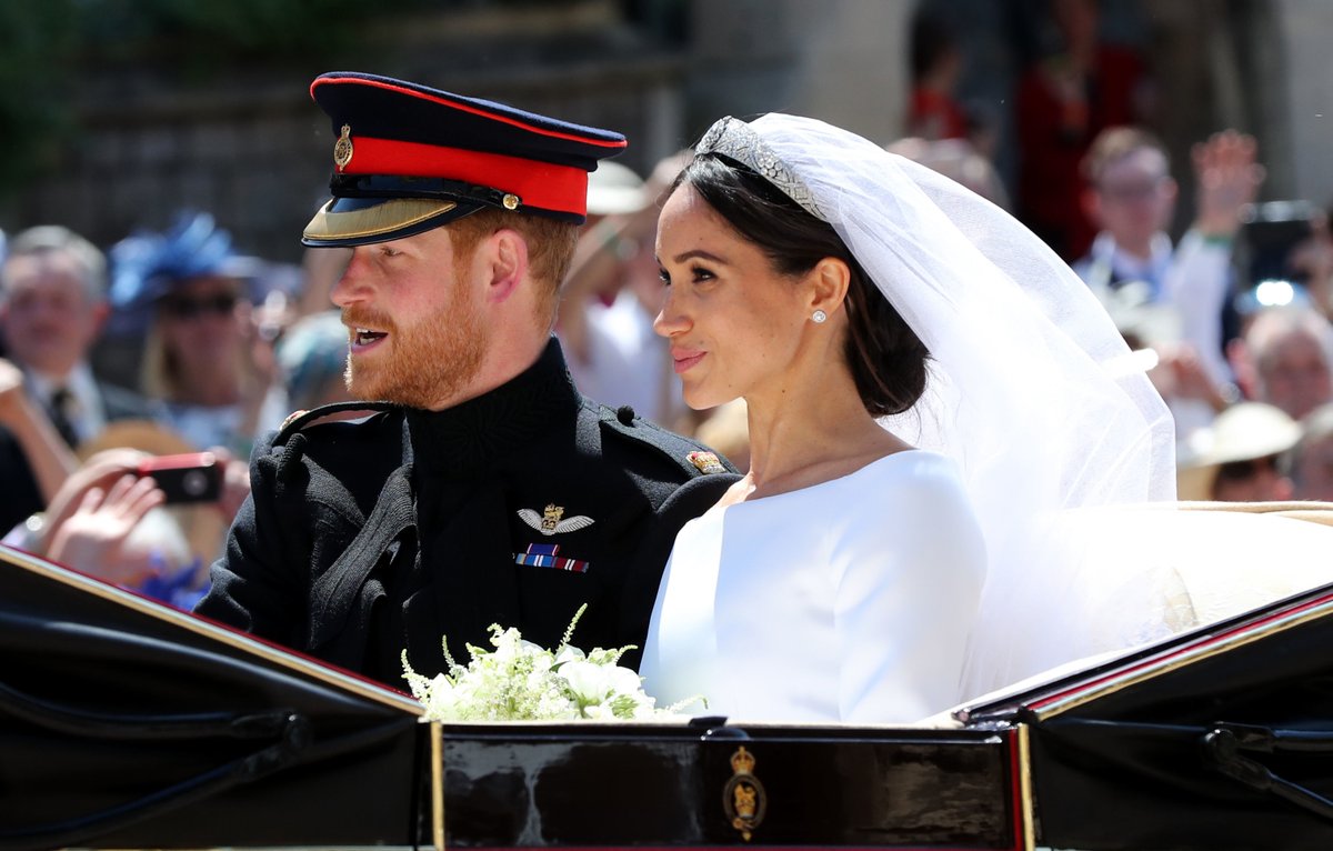 Prince Harry and Meghan issue new wedding photo on Christmas card