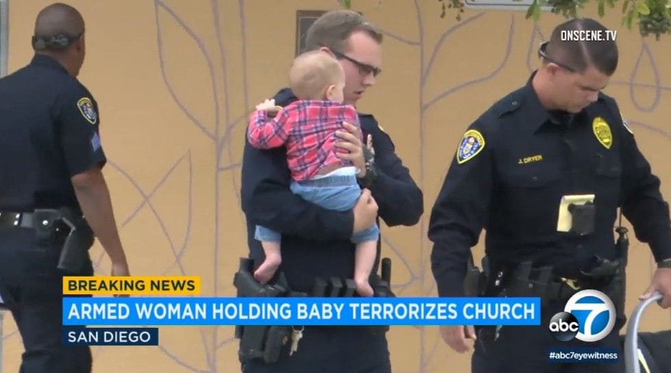 Woman waving handgun, carrying baby, threatens to blow up US church