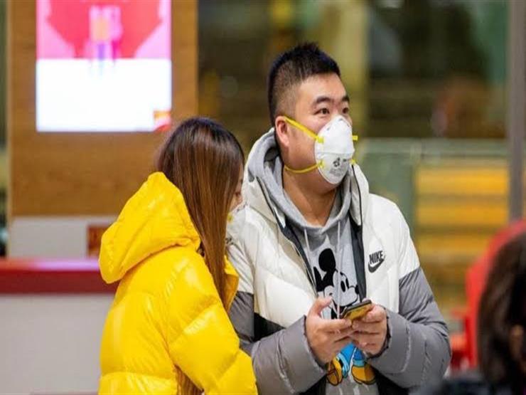 Coronavirus infections top 20,000 as Hong Kong reports first death