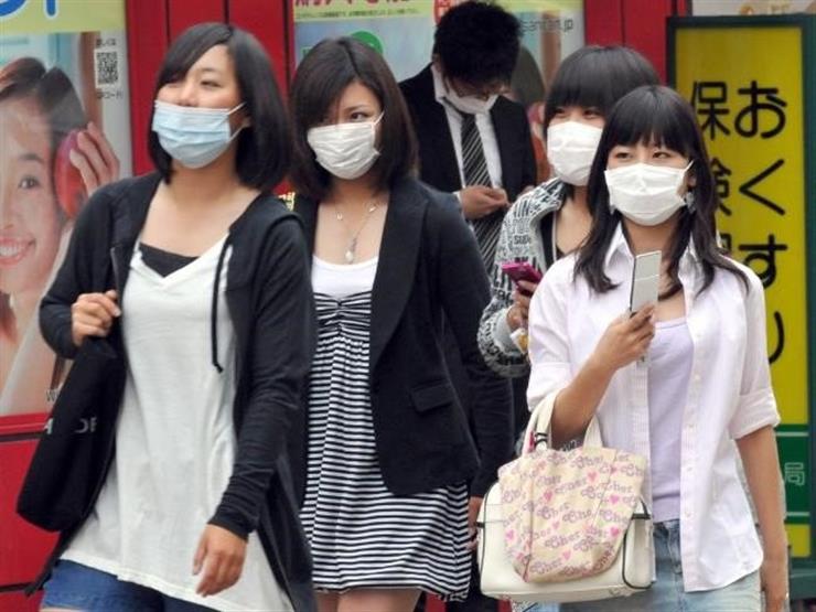 Summer heat prompts Japanese authorities to advise removal of masks Summer heat prompts Japanese authorities to advise removal of masks