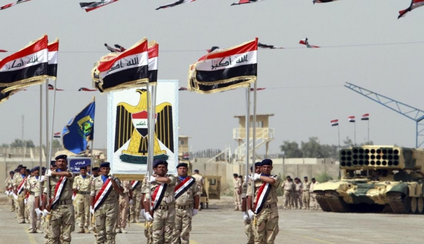 US-led alliance hands over military site to Iraqi army