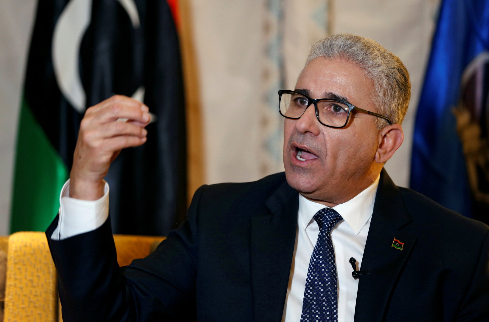 Libya's UN-backed government suspends interior minister over protests   Libya's UN-backed government suspends interior minister over protests