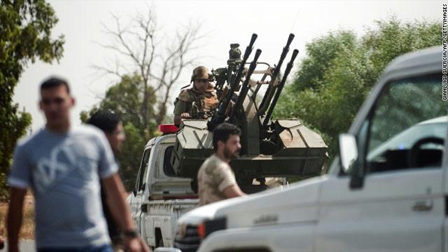 At least 31 dead as Tripoli residents rebel against militias