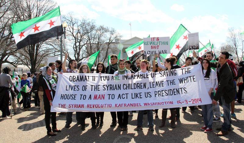 Thousands march in Western capitals to support Syrians