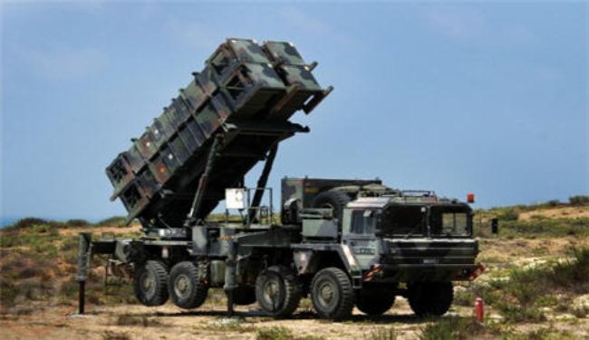 Qatar to buy Patriot missiles in $11 bln arms deal: US