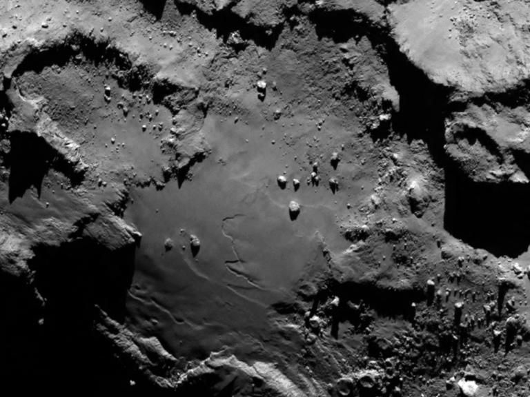Probe makes space history with rendezvous with comet