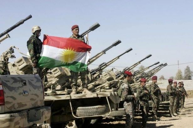 Peshmerga bolster Kurd defenders of Syrian town