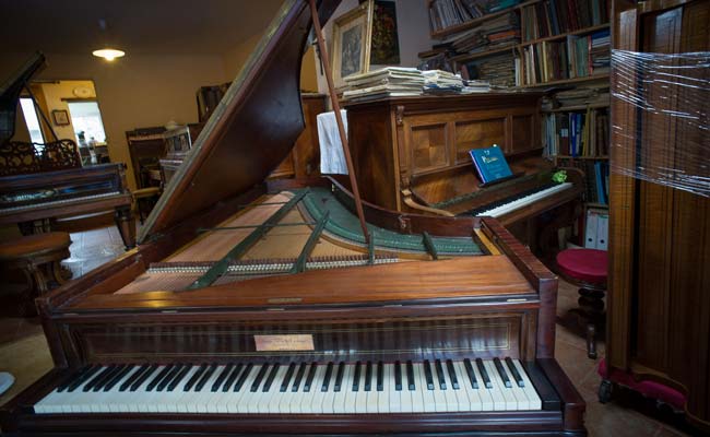 Eccentric French collector turns home into piano 'orphanage'