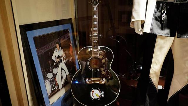 Beatles guitar headlines NY music auction Beatles guitar headlines NY music auction