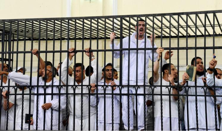 Egypt's Morsi, 100 others sentenced to death