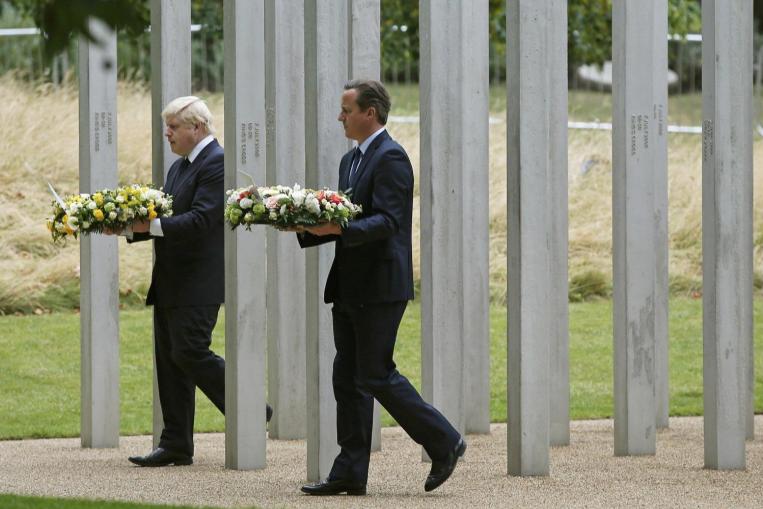 Britain remembers 2005 bombs with flowers and silence