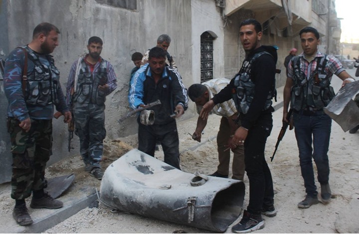 Barrel bombs kill 11 civilians in IS town in Syria