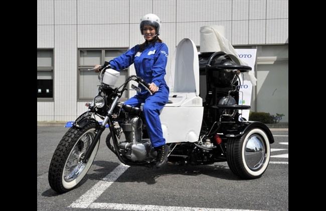 Japanese toilet giant flipping open lid on new museum Japanese toilet giant flipping open lid on new museum