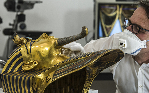 Tutankhamun's gold mask restored after botched repair
