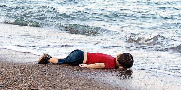 Drowned Syrian toddler's father wept over French cartoon