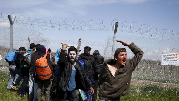  refugees protest after woman dies in Greek camp
