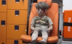 Photo of dazed Syrian boy symbolises Aleppo's plight