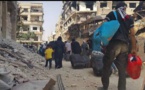 Evacuation begins from Daraya, symbol of Syria revolt