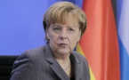 Merkel drops 'we can do it' rallying cry on migrants