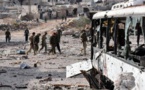 Checkpoints, detours and signs of military push along the road to Aleppo