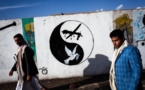 Yemen artists paint on walls to protest war