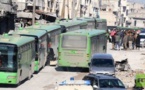 Buses evacuate hundreds from four besieged Syria towns