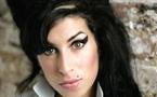 Amy Winehouse hospitalised after fainting 