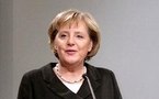 Merkel urges real progress in Afghanistan by 2014