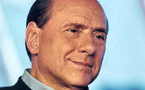 Berlusconi confesses his love for 'beautiful women'