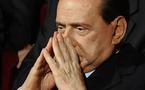 Berlusconi celebrates birthday in earthquake town