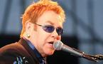 Sick Elton John postpones US gigs with Joel