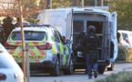 Man arrested after taking 2 people hostage at Britain bowling alley  
