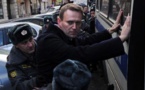 Putin foe Navalny detained, office raided amid protests across Russia