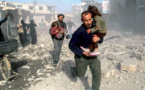 Syrian forces pound rebel bastion near Damascus, war monitor says