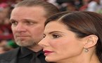 Oscar winner Bullock divorces husband, adopts a baby: People