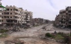 Hundreds of Syrian rebels, civilians leave besieged town of Harasta