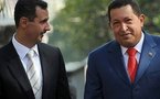 Chavez hails anti-capitalism role as Assad visits