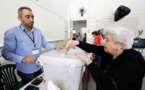 Hezbollah, allies set for majority in parliament, early reports say