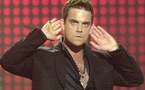 Stars from British band Take That in live show reunion