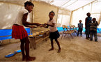 Haitian orphans paint, photograph their tragedy