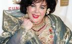 Liz Taylor backs 'King's Speech,' from hospital bed