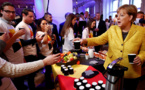Merkel marks 100 years' women's suffrage with call for more women MPs