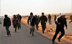 Brega battle rages as another Kadhafi man quits