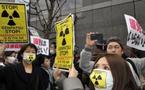 Aftershock hits Japan as nuclear evacuation zone grows